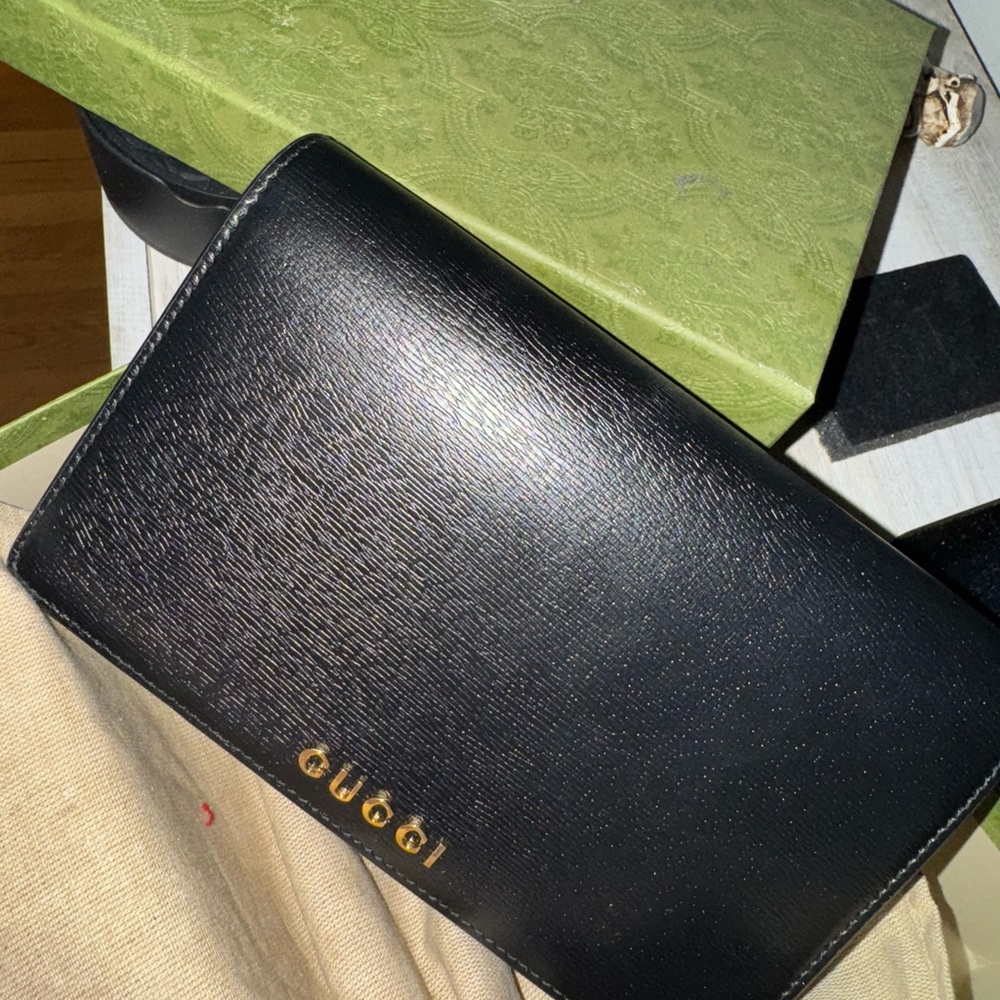 Gucci Black Leather Clutch with Gold Logo